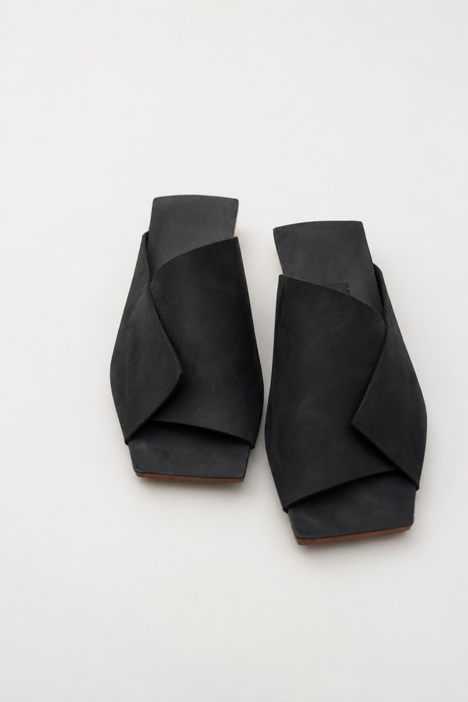 Black minimal hand made leather slides by NINObrand