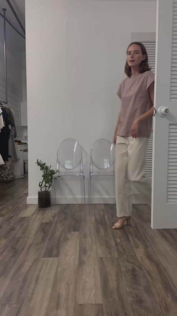 A video thumbnail showing the Thea Plaid top in motion to demonstrate the fabric's lightweight feel.