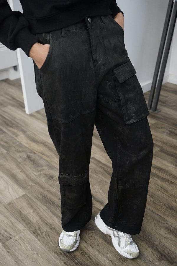 A video thumbnail showing the Atlas pants in motion, demonstrating the fit and how the fabric moves.