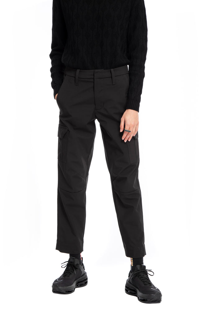 NINObrand Medici Technical Cargo Pants Cargo pants with snap closure Has front pockets, back welt pockets, and patch pockets with flaps on the side seam Water proof technical fabric Synthetic fibers Machine wash cold